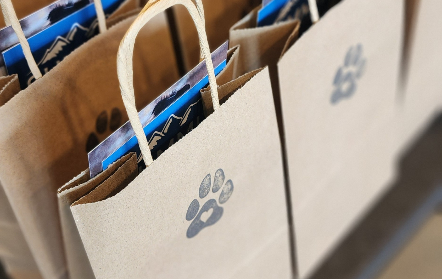blog header paw print paper goodie bags